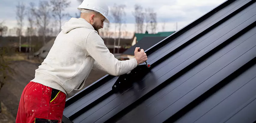Tin Roof Ridge Cap Installation in Algonquin